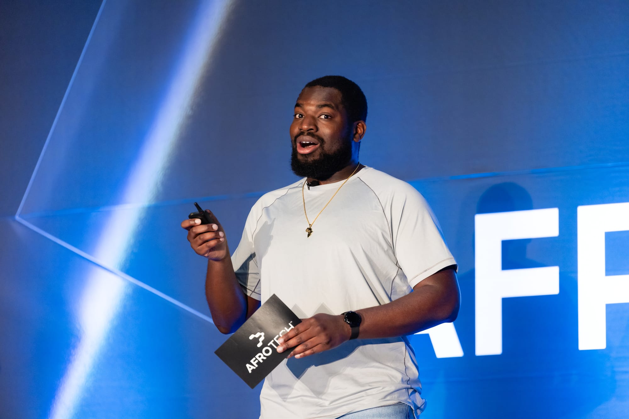 Alex Oladele speaking at AfroTech Conference 2024